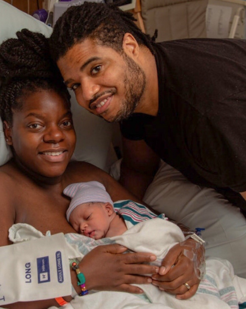 Mom, dad and newborn baby in the hospital